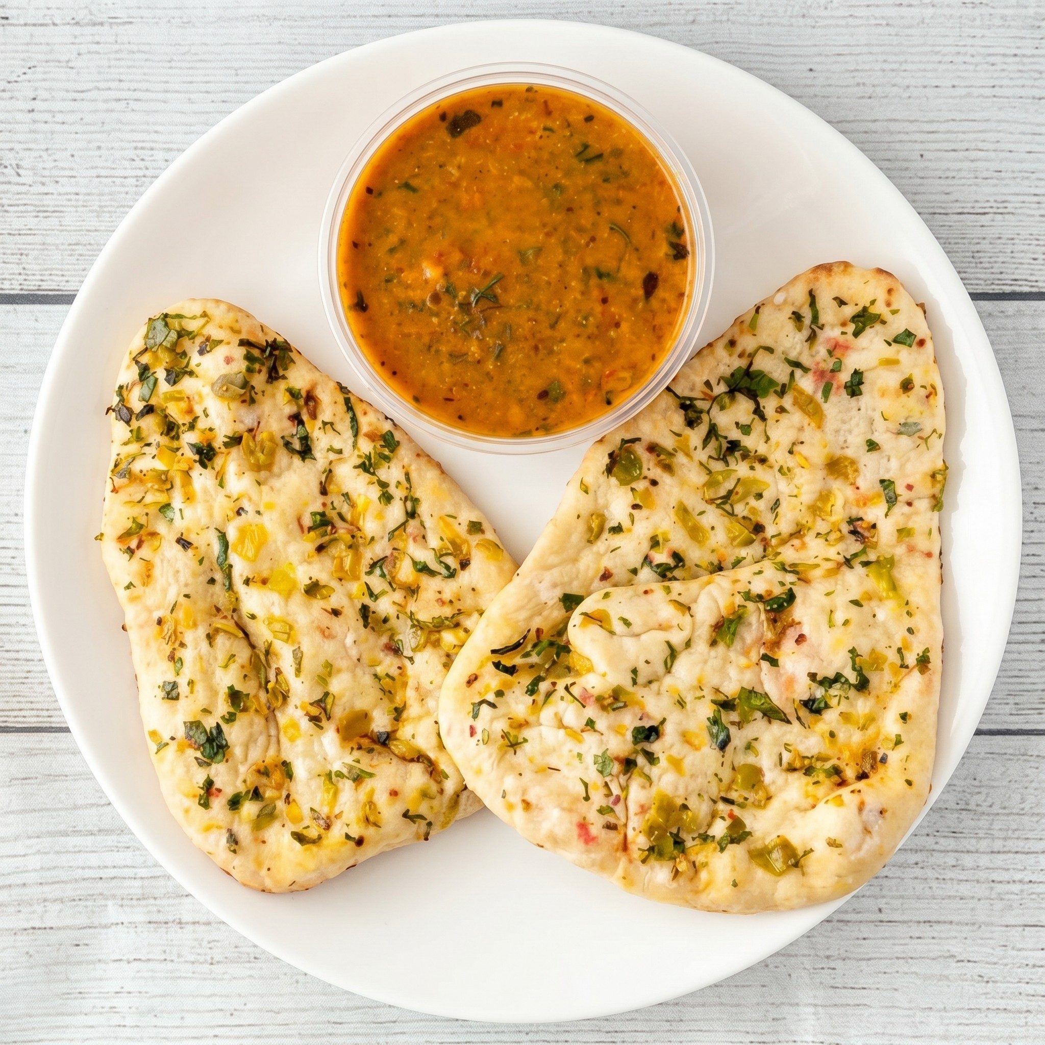 Butter Paneer Masala Garlic Naan.